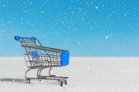 Shopping Cart On The Snow. Last Minutes Of Christmas Sale. Countdown To The End Of Discounts. Hurry Up For Gifts. Preparing For The Holiday. Special Offers. Have Time To Buy.