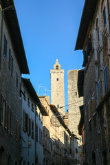 Fototapeta na wymiar Old town of San Gimignano streets and medieval towers, Tuscany, Italy