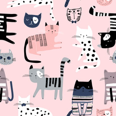 Seamless pattern with cute colorful Kittens. Creative childish texture. Great for fabric, textile Vector Illustration © solodkayamari