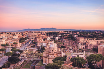 Fototapeta na wymiar Catholic church Rome – Chiesa dei Santi Luca e Martina and Colosseum in the background