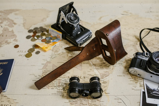 vintage map, film cameras, antique binoculars