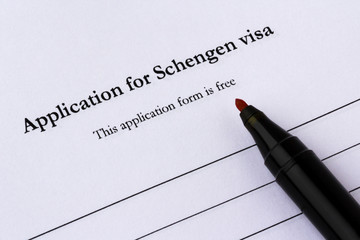 Application for Schengen visa with pen