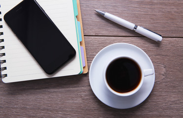 notebook pen smartphone coffee