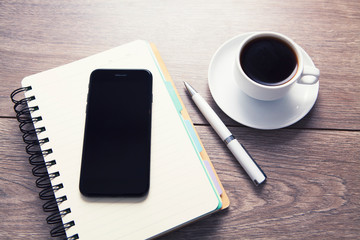 notebook pen smartphone coffee