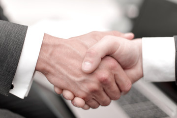close up. handshake business partners.