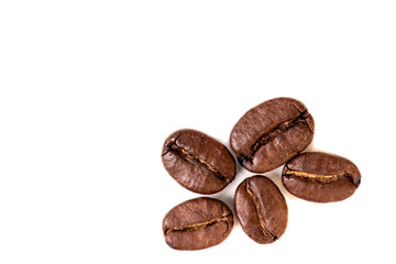 close-up of coffee beans on white background, top view