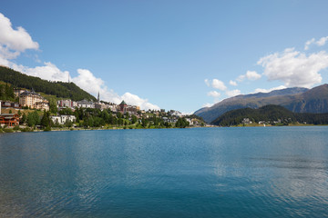 Sankt Moritz town and lake, wide angle view in a sunny summer day in Switzerland