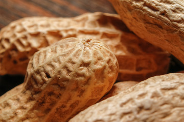 Whole peanut in their shells. Close up, macro background.