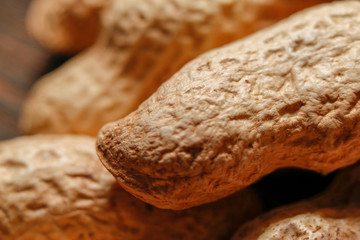 Whole peanut in their shells. Close up, macro background.
