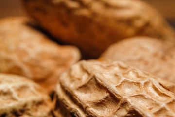 Whole peanut in their shells. Close up, macro background.