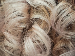 Bright curls of hair, female hairstyles.