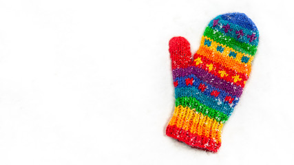 Colorful Mitten In Snow