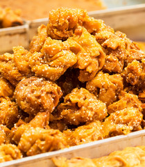 a bunch of oriental sweets on the market. Selective focus