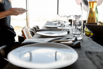 Empty glasses on the table and light table setting 