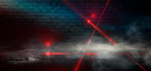 Dark room, street, tunnel, corridor, background with searchlight rays and a red laser beam, smoke, smog, dust. Abstract dark blue background with neon and rays.