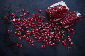 Red juice pomegranate on dark background,Pomegranate fruit 