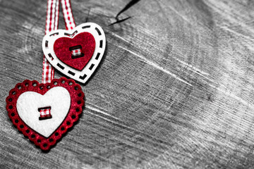 Red hearts on black and white background