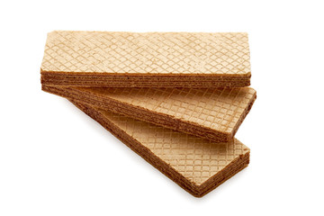 Three rectangle corrugated wafer biscuits isolated on white