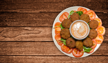 Falafel on plate with salad