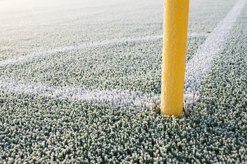 corner of football pitch during winter morning © Dziurek