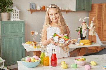 Easter greeting card with gingerbread cookies and eggs. Easter Postcard Template. Cookies in shape of eggs and bunny. Happy Easter holiday concept, girl with easter gingerbread cookies and eggs