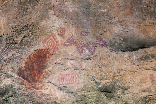 Prehistoric paintings on rock known as petroglyphs in the municipality of Facatativa in Colombia