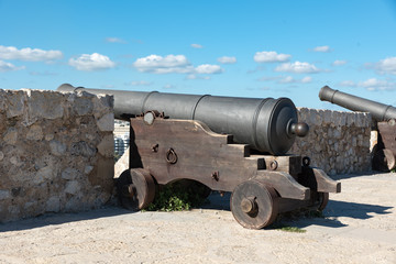 Fototapeta na wymiar Ancient bronze cannon in Ibiza