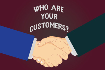 Writing note showing Who Are Your Customersquestion. Business photo showcasing Know your leads clients Business analysisagement Hu analysis Shaking Hands on Agreement Sign of Respect and Honor