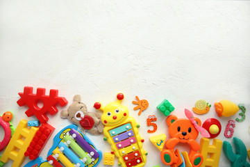 Children's toys and accessories on a white background. View from above