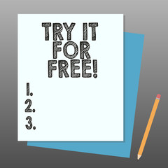 Conceptual hand writing showing Try It For Free. Business photo showcasing Trial at not any cost Offer promotion big discount Stack of Different Pastel Color Construct Bond Paper Pencil