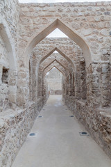 Obraz premium Archway in Bahrain Fort (Qal'at al-Bahrain) in Bahrain