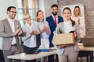 New member of team, newcomer, applauding to female employee, congratulating office worker with...