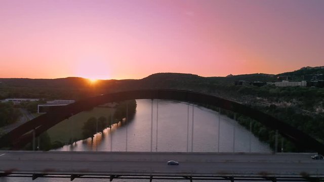 4K Aerial of 360 Bridge at Sunset Pink Sky