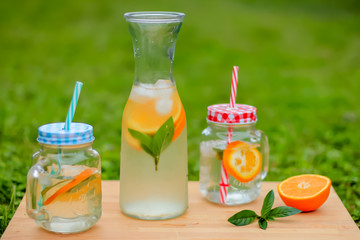 Fresh aromatic water orange and mint leaf