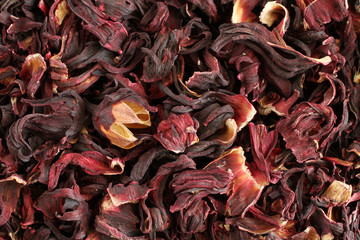 Hibiscus flowers leaves situated irregularly. Closeup. Background