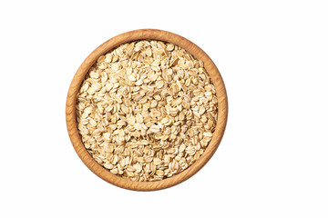 Oat flakes uncooked  in  wooden  bowl isolated on white background