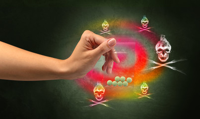 Female hand delivers illegal capsules with death s head wallpaper