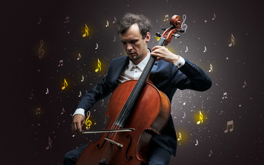 Fototapeta premium Young cellist with falling musical notes wallpaper and classical concept