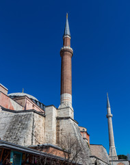 The high tower of the minaret of a mosque in Istanbul, Turkey