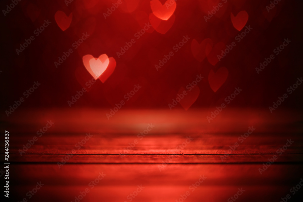 Wall mural Bright red hearts abstract bokeh background