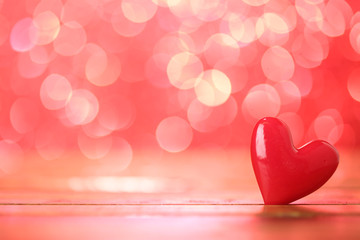 Single heart and red bokeh abstract background
