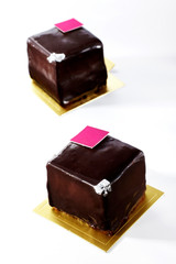 Cute and beautiful small round birthday cake on a white background
