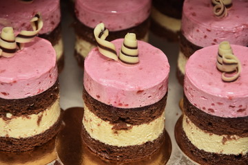 wedding cake round with pink banana cream 