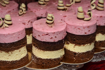 wedding cake round with pink banana cream 
