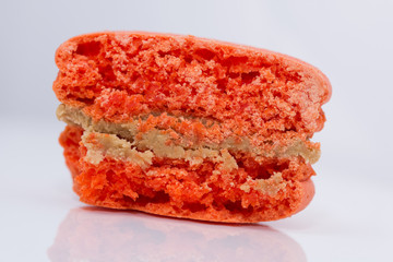 orange  macarons on white background