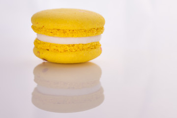 yellow  macarons on white background