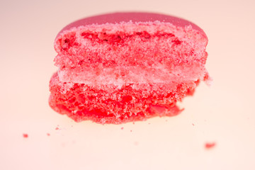 pink  macarons on white background