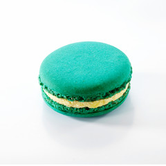 Cute pastry macaron, on a white background