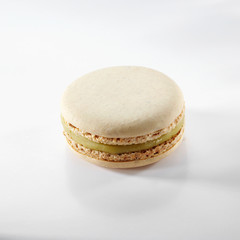 Cute pastry macaron, on a white background