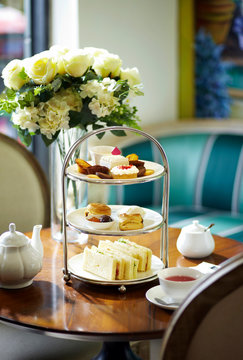 Delicious English Afternoon Tea Set On A White Background